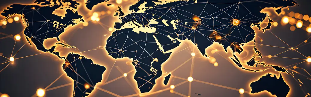 planisphère sombre parcouru de lignes lumineuses dorées reliant les continents